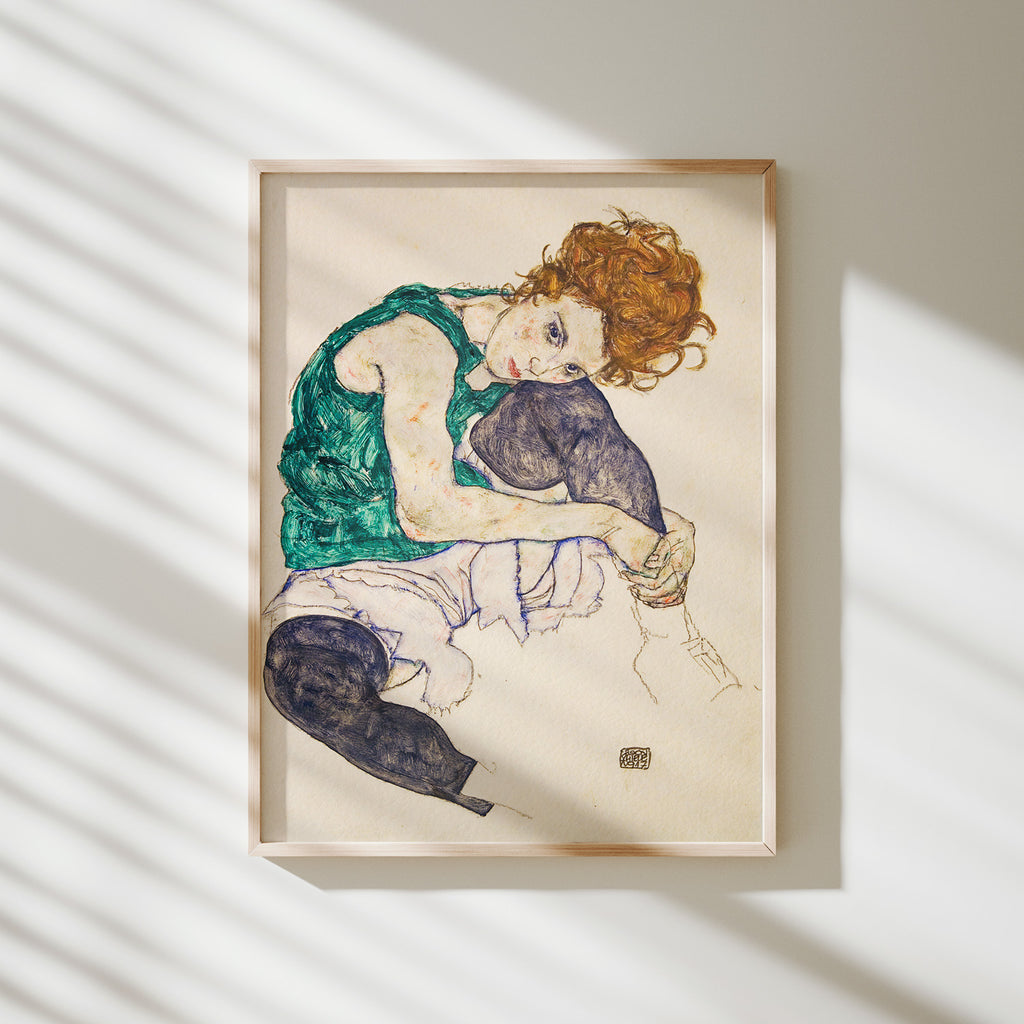 mujer sentada con la pierna recogida schiele