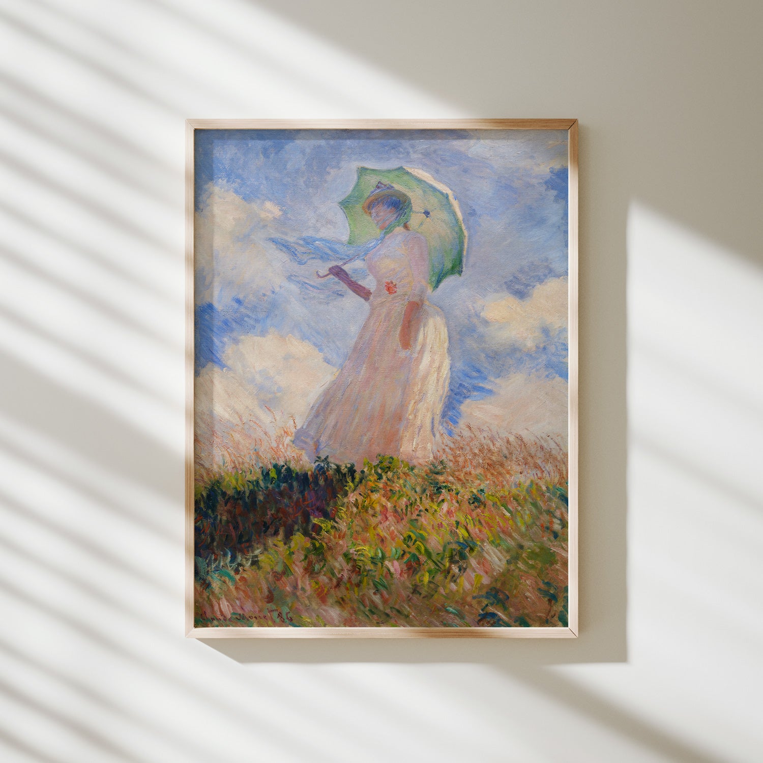 mujer con sombrilla vuelta a la izquierda monet